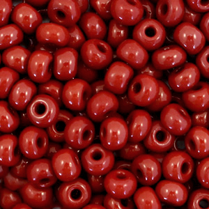 Preciosa 6/0-93300 Rocailles Natural opaque-port royale red
