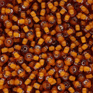 Preciosa 6/0 Rocailles Ornela-15096 White lining-topaz brown