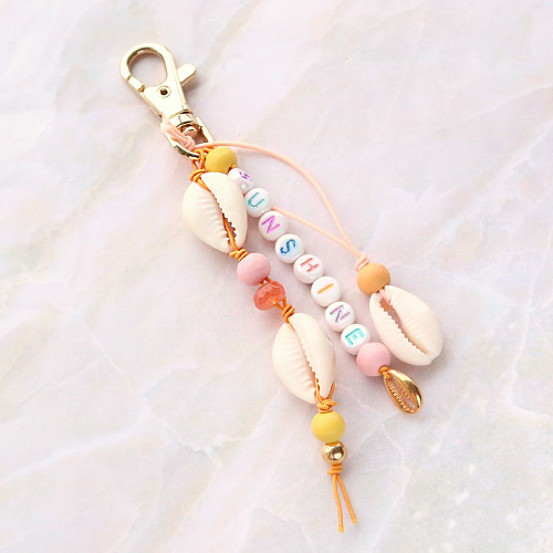 Schmuck mit einem Strandthema aus Holzperlen, DQ Metall und Muscheln