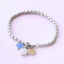 Ohrringe und Armb&auml;nder mit Anh&auml;ngern aus Kristallglas