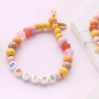 Schmuck mit einem Strandthema aus Holzperlen, DQ Metall und Muscheln