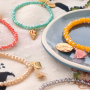 Schnelle Facett Armb&auml;nder mit Anh&auml;ngern und Quasten