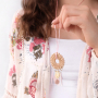 DIY Schmuck f&uuml;r die Festival Saison mit Federn und Rotan Anh&auml;ngern