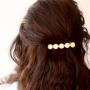 Wie macht man trendigen Haarschmuck und Schmuck mit Kauri Muschelperlen?