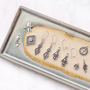 DQ Metall Schmuck und Schl&uuml;sselanh&auml;nger mit einer weichen Farbpalette
