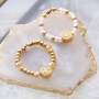 Gestalten Sie stilvollen Schmuck mit Yin-Yang-Anh&auml;ngern und Smiley-Perlen