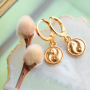 Gestalten Sie stilvollen Schmuck mit Yin-Yang-Anh&auml;ngern und Smiley-Perlen