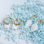 Sehen Sie, wie man Sommerschmuck mit Muschelanh&auml;ngern macht 