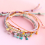 Mit Mini-Quasten verspielten Schmuck designen