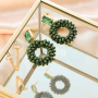 So entwerfen Sie extravagante Statement-Ohrringe