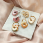 Designen mit griechischen DQ-Donut Perlen aus Keramik 